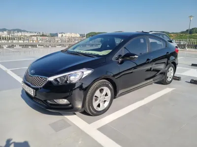 Kia K3 · 2013 год