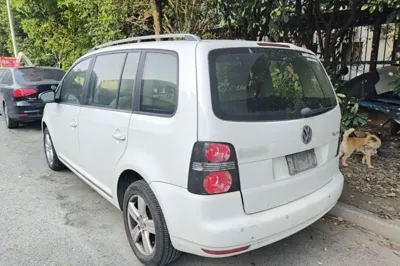 Volkswagen Touran 2015, 149700 км, за 44251.89 CNY