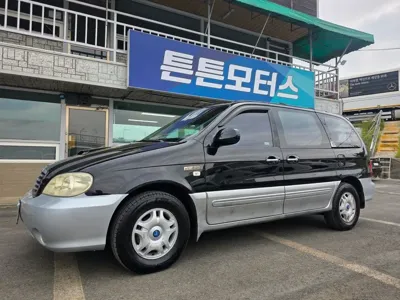 Kia Canival · 2003 год