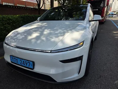 Tesla Model Y · 2025 год