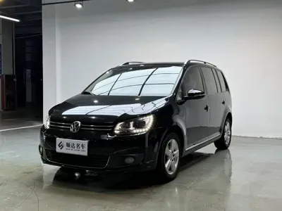 Volkswagen Touran · 2013 год