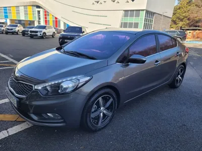 Kia K3 · 2013 год