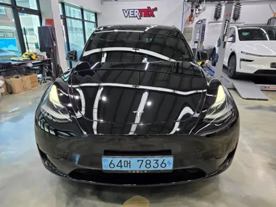 Tesla Model Y · 2024 год