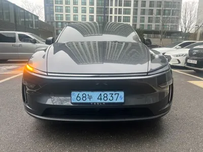 Tesla Model Y · 2025 год