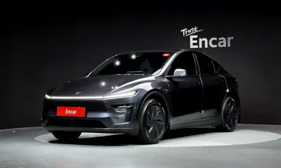 Tesla Model Y · 2025 год
