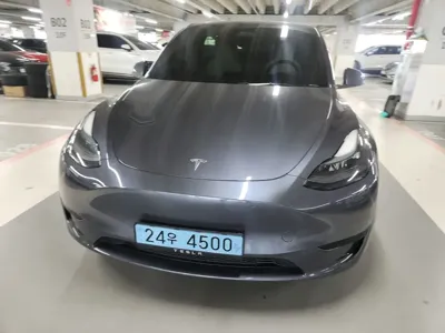 Tesla Model Y · 2024 год