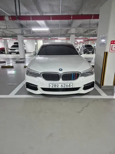 BMW 5-Series · 2017 год