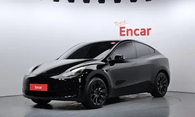 Tesla Model Y · 2024 год