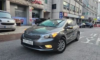 Kia K3 · 2013 год