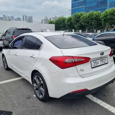 Kia K3 · 2013 год