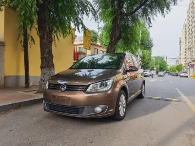 Volkswagen Touran · 2014 год