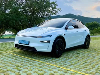 Tesla Model Y · 2025 год