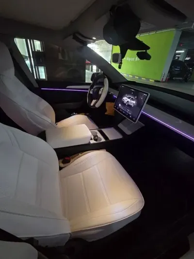Tesla Model Y · 2023 год