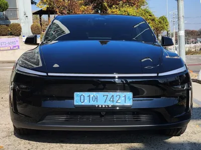 Tesla Model Y · 2025 год